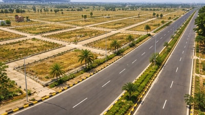 Gaurs Group buys 35-acre land parcels along Yamuna Expressway from ICICI Bank for around  ₹700 crore